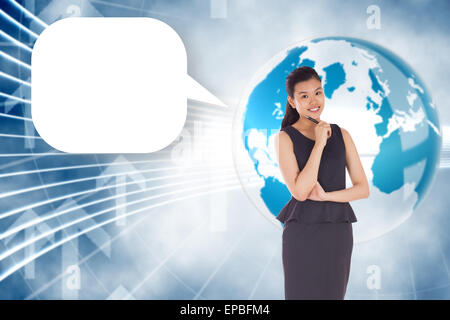 Composite image of thoughtful asian businesswoman with speech bubble Stock Photo