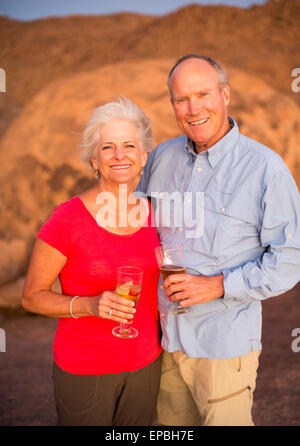Africa, Namibia. Mowani Mountain Camp. Couple posing for the camera. Stock Photo
