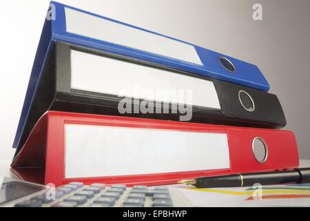 Stack of three business binders Stock Photo