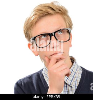 Thoughtful teenage nerd boy wearing geek glasses against white background Stock Photo Alamy