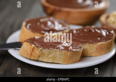 baguette with chocolate spread with nuts Stock Photo