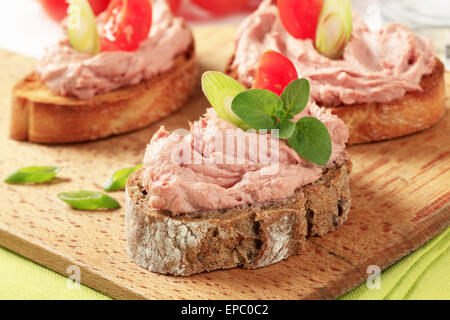 Slices of bread with smooth meat spread Stock Photo