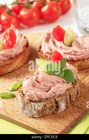 Slices of bread with smooth meat spread Stock Photo