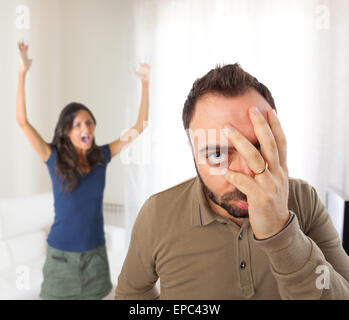 Relationship problems between husband and wife in the home. Stock Photo