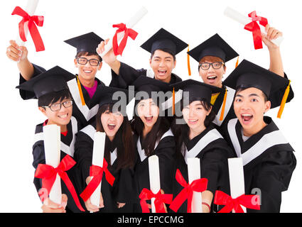 Group Of asian Students Celebrating Graduation Stock Photo