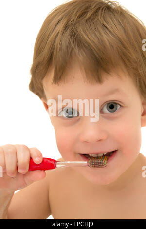 Three years child brushing teeth isolated on white Stock Photo