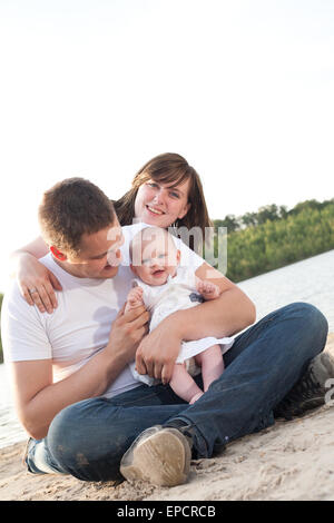 Young family have a trip on vacation Stock Photo