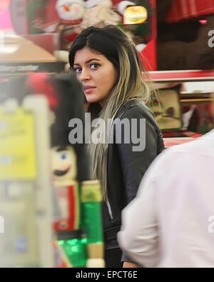 A camera-shy Kylie Jenner shops at CVS Pharmacy wearing a black leather  motorcycle jacket holding a black Givenchy bag Featuring: Kylie Jenner  Where: Los Angeles, California, United States When: 11 Nov 2014