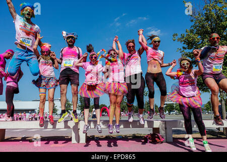 Turin, Italy. 16th May, 2015. Some guys all colored having fun jumping. Credit:  Elena Aquila/Pacific Press/Alamy Live News Stock Photo