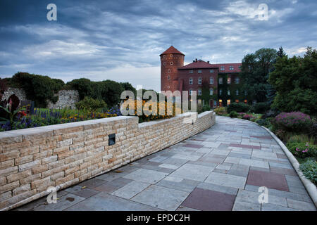Krakow, Poland, Wawel Royal Castle gardens, alley in the evening. Stock Photo