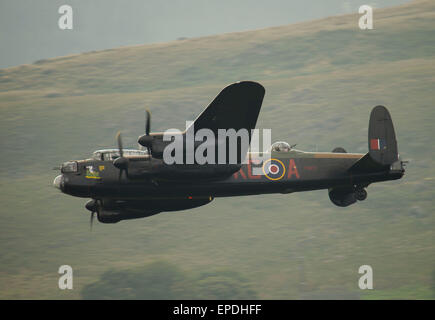 Pictured here is Avro Lancaster Bomber VERA, in flight over Ladybower Reservoir in the Derwent Valley, Derbyshire. Stock Photo