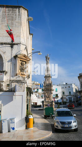 OSTUNI, ITALY - MARCH 14, 2015: Statue of San Oronzo in the center of the medieval town Ostuni, Puglia, Italy. Stock Photo