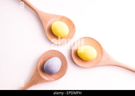 Easter egg on spoon isolated on white Stock Photo