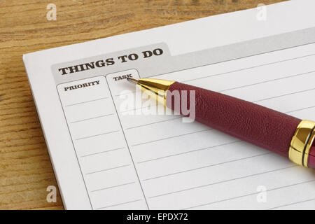 Things To Do list with a pen, on a desk.Business concept. Stock Photo