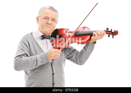 Senior musician playing a violin with a wand isolated on white background Stock Photo