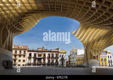 Canopy of Metropol Parasol framing buildings around Plaza of the Incarnation Seville Spain