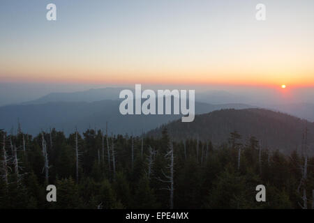 The morning sun rises over Clingman's Dome in Tennessee's Great Smoky Mountain National Park. Stock Photo