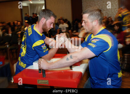 Vancouver, Canada. 17th May, 2015. Arm wrestlers compete during the 2015 Canadian Arm Wrestling Championships in Vancouver, Canada, May 17, 2015. Best Canadian arm wrestlers gathered here to battle for the trophy and champion title. Winners will represent Canada at the 2015 World Armwrestling Championships in September in Kuala Lumpur, Malaysia. © Sergei Bachlakov/Xinhua/Alamy Live News Stock Photo