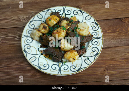 kazan-kabob -  fried meat and potatoes .Central Asian cuisine Stock Photo