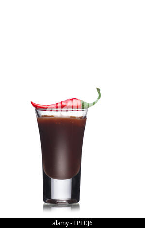 Dessert with chocolate decorated with red hot chilli pepper in a shot glass. Sweet food. Parfait Stock Photo