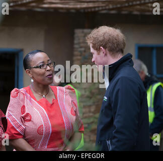 Prince Harry chats to a lady from South Africa who then sang to him at the RHS Chelsea flower show 2015 Stock Photo