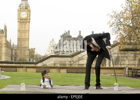 The shortest man ever Chandra Bahadur Dangi 54.6com - 21.5 inches) and the tallest living man Sultan Kosen 251cm - 8ft 3 inches) meet for the first time in London to mark the tenth annual Guiness world records day, who is celebrating their 60th anniversary.  Featuring: Sultan Kosen,Chandra Bahadur Dangi Where: London, United Kingdom When: 13 Nov 2014 Credit: Euan Cherry/WENN.com Stock Photo