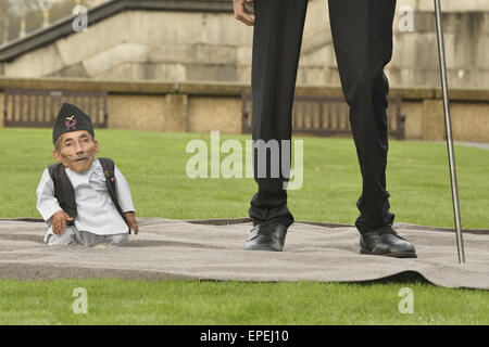 The shortest man ever Chandra Bahadur Dangi 54.6com - 21.5 inches) and the tallest living man Sultan Kosen 251cm - 8ft 3 inches) meet for the first time in London to mark the tenth annual Guiness world records day, who is celebrating their 60th anniversary.  Featuring: Sultan Kosen,Chandra Bahadur Dangi Where: London, United Kingdom When: 13 Nov 2014 Credit: Euan Cherry/WENN.com Stock Photo