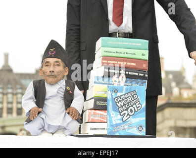 The shortest man ever Chandra Bahadur Dangi 54.6com - 21.5 inches) and the tallest living man Sultan Kosen 251cm - 8ft 3 inches) meet for the first time in London to mark the tenth annual Guiness world records day, who is celebrating their 60th anniversary.  Featuring: Sultan Kosen,Chandra Bahadur Dangi Where: London, United Kingdom When: 13 Nov 2014 Credit: Euan Cherry/WENN.com Stock Photo