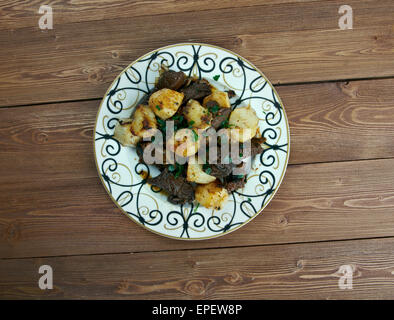 kazan-kabob -  fried meat and potatoes .Central Asian cuisine Stock Photo