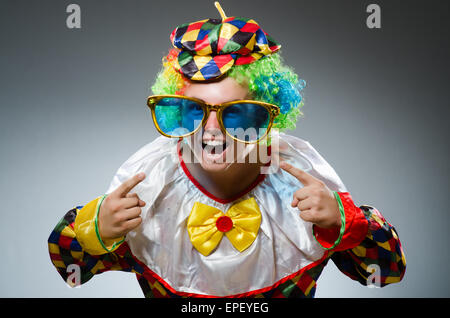 Funny clown with giant sunglasses Stock Photo