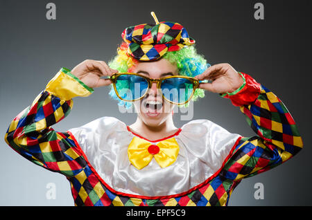 Funny clown with giant sunglasses Stock Photo