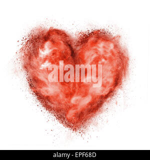 red heart made of black powder explosion isolated on white Stock Photo