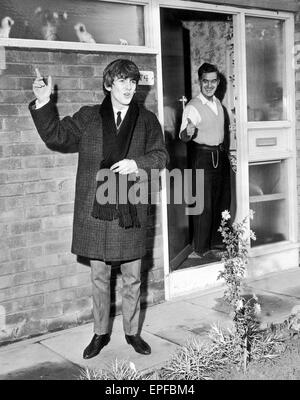 George Harrison saying goodbye to his father Harold Hargreaves Harrison, 7th December 1963.  The Beatles are in Liverpool for two live shows for BBC Television, BBC's `It's The Beatles' filmed at the Fans Club Convention. Stock Photo