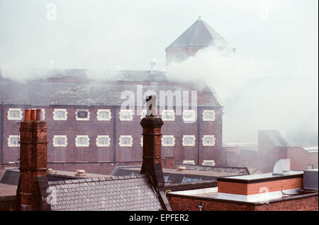 Strangeways Prison Riot April 1990.  A 25-day prison riot and rooftop protest at Strangeways Prison in Manchester, England. The riot began on the 1st April 1990 when prisoners took control of the prison chapel, and the riot quickly spread throughout most Stock Photo