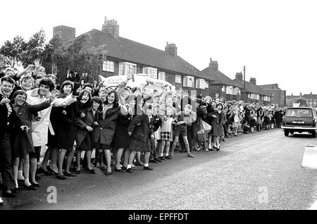 The Beatles in Liverpool for the Premier of a Hard Day's Night. Fans line the streets in hope to catch a glimpse of The Beatles during their trip to Liverpool 10th July 1964.