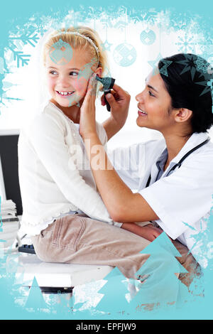 Cute little girl attending a medical checkup Stock Photo