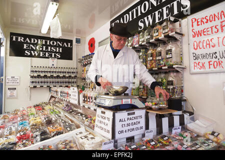 Traditional English sweets. British Sweets. Man selling old English sweets. London, England, UK. Sweet seller UK. Candy store. Stock Photo