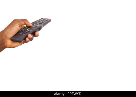Mans hand holding remote control Stock Photo