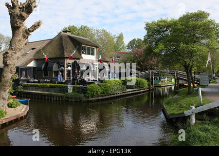 Restaurant along the main canal in the popular tourist village of Giethoorn, Overijssel, The Netherlands Stock Photo