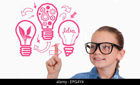 Composite image of cute pupil pointing Stock Photo