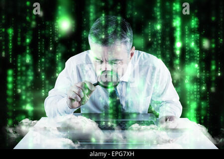Composite image of mature businessman examining with magnifying glass Stock Photo