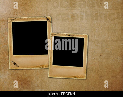 Old paper slides for photos on rusty abstract background Stock Photo