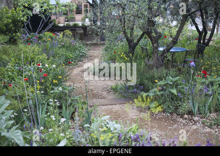 London, UK. 18th May, 2015. ''A Perfumer's Garden in Grasse'' by James Basson, a naturalistic and frangranced garden for L'Occitane. The Chelsea Flower Show organised by Royal Horticultural Society (RHS) in the grounds of the Royal Hospital Chelsea every May, is the most famous flower show in the United Kingdom, perhaps in the world. It attracts exhibitors and visitors from around the world, London, UK. Credit:  Veronika Lukasova/ZUMA Wire/Alamy Live News Stock Photo