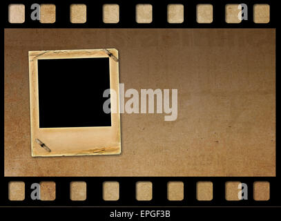 Old paper slides for photos on rusty abstract background Stock Photo