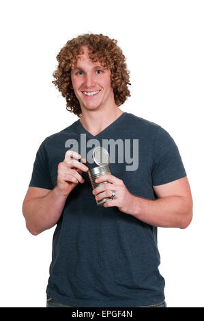 Man eating canned food Stock Photo