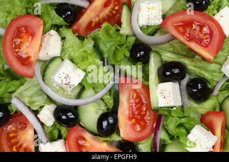 Griechischer Salat Hintergrund mit Tomaten, Feta K├ñse und Oliven Stock Photo