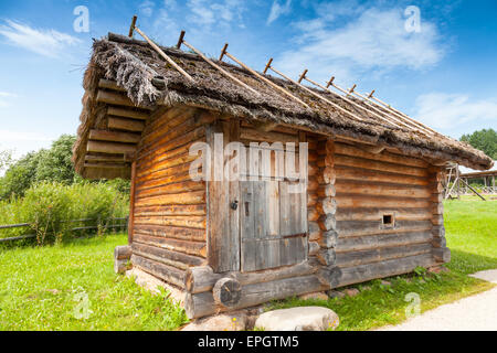 Wooden architecture example, small rural Russian bath building in a rural courtyard Stock Photo