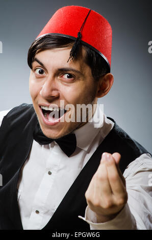 Man wearing traditional turkish hat fez Stock Photo