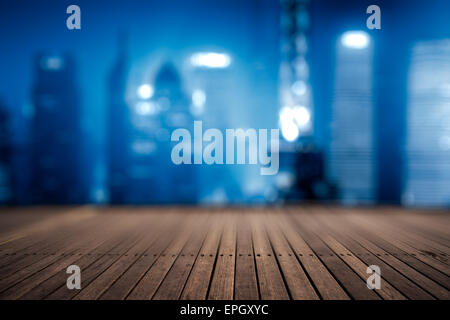 wooden platform and lights of night city Stock Photo