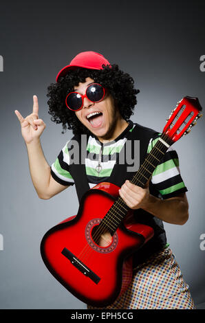 man with funny haircut and guitar Stock Photo - Alamy